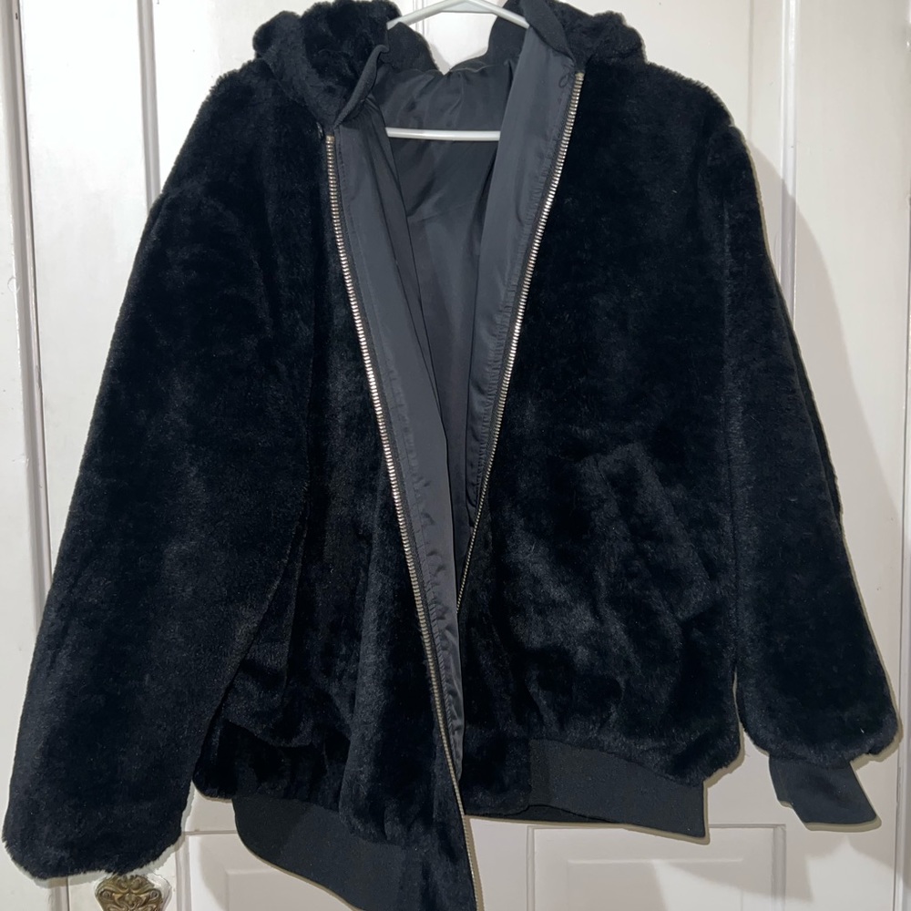 Garage reversible jacket, fur on one side and waterproof lining on other.
